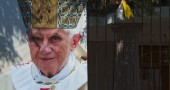 An image of Pope Benedict XVI is seen by