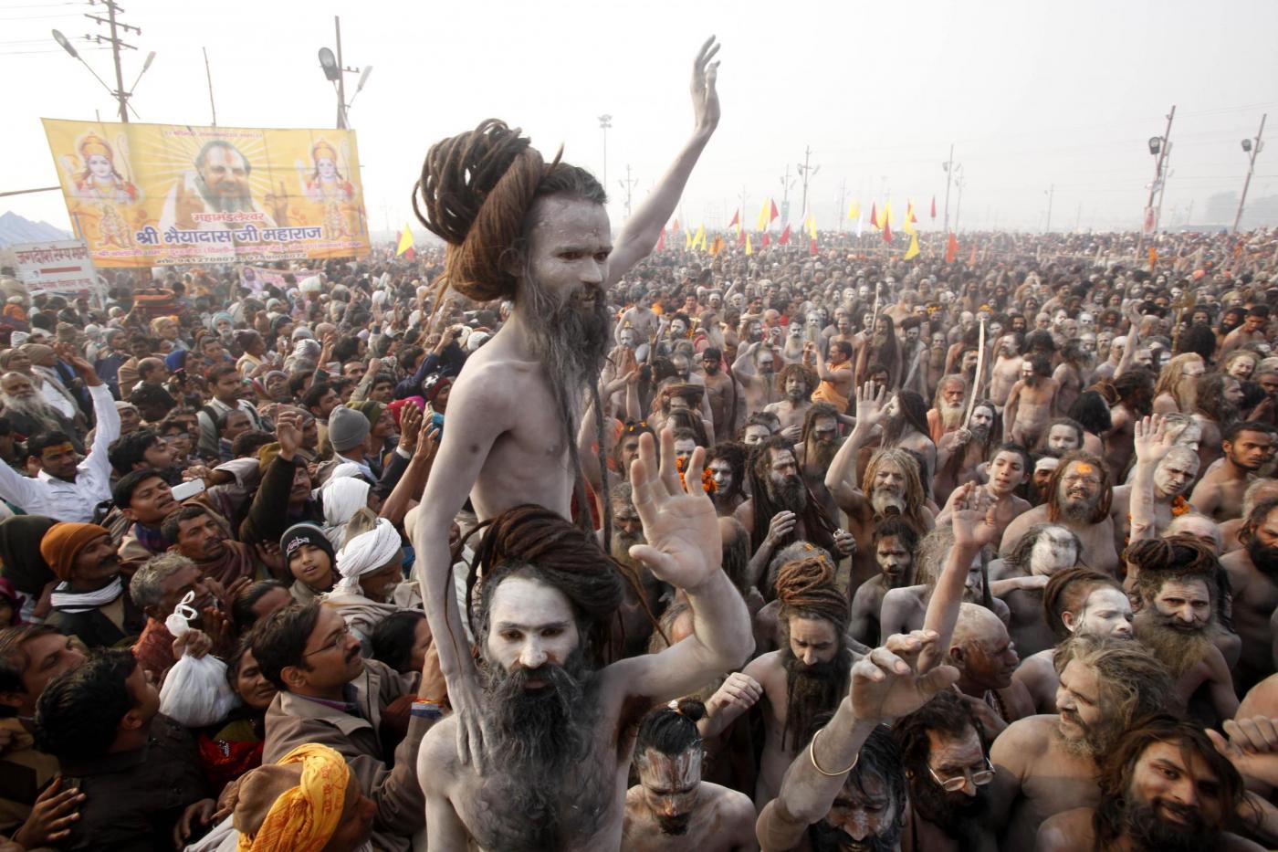 Tens of thousands take holy dip at Indias Kumbh Mela