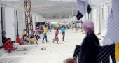 Syrian refugees go about their daily liv