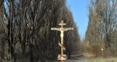 A cross is pictured in the ghost city of
