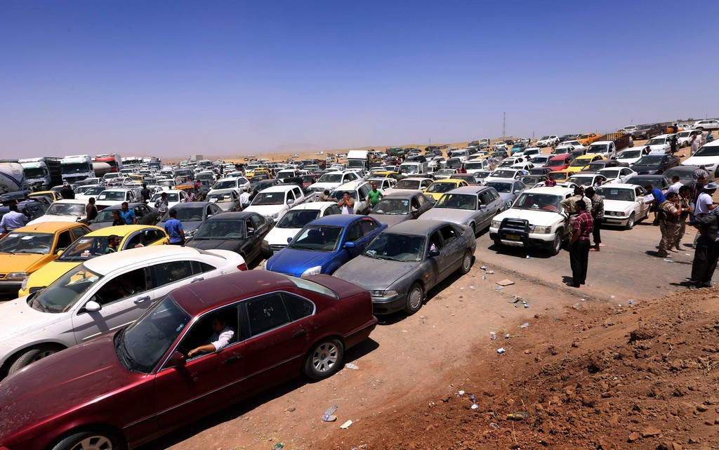 Un anno fa, la fuga di massa degli abitanti di Mosul all'arrivo dell'ISIS   (Photo credit SAFIN HAMED/AFP/Getty Images)