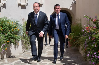 François Hollande e Manuel Valls. AP Photo/Bertrand Langlois, Pool