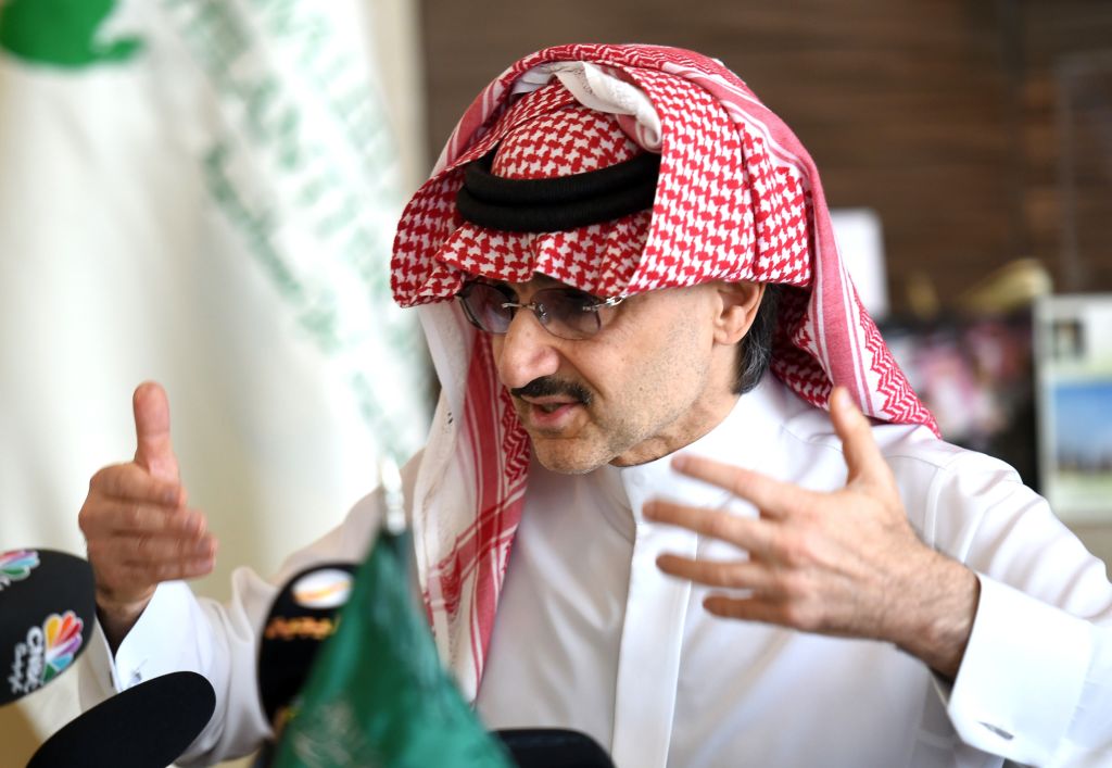 audi Arabia's billionaire Prince Alwaleed bin Talal gestures during a press conference in the Saudi capital, Riyadh, on July 1, 2015. Alwaleed pledged his entire $32-billion (28.8-billion-euro) fortune to charitable projects over the coming years. The prince said in a statement that the 'philanthropic pledge will help build bridges to foster cultural understanding, develop communities, empower women, enable youth, provide vital disaster relief and create a more tolerant and accepting world.' AFP PHOTO / FAYEZ NURELDINE (Photo credit should read FAYEZ NURELDINE/AFP/Getty Images)